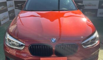 BMW 118I naranjo 2018 lleno
