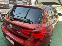 BMW 118I naranjo 2018 lleno