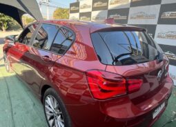 BMW 118I naranjo 2018 lleno