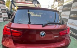 BMW 118I naranjo 2018 lleno