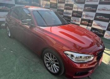 BMW 118I naranjo 2018